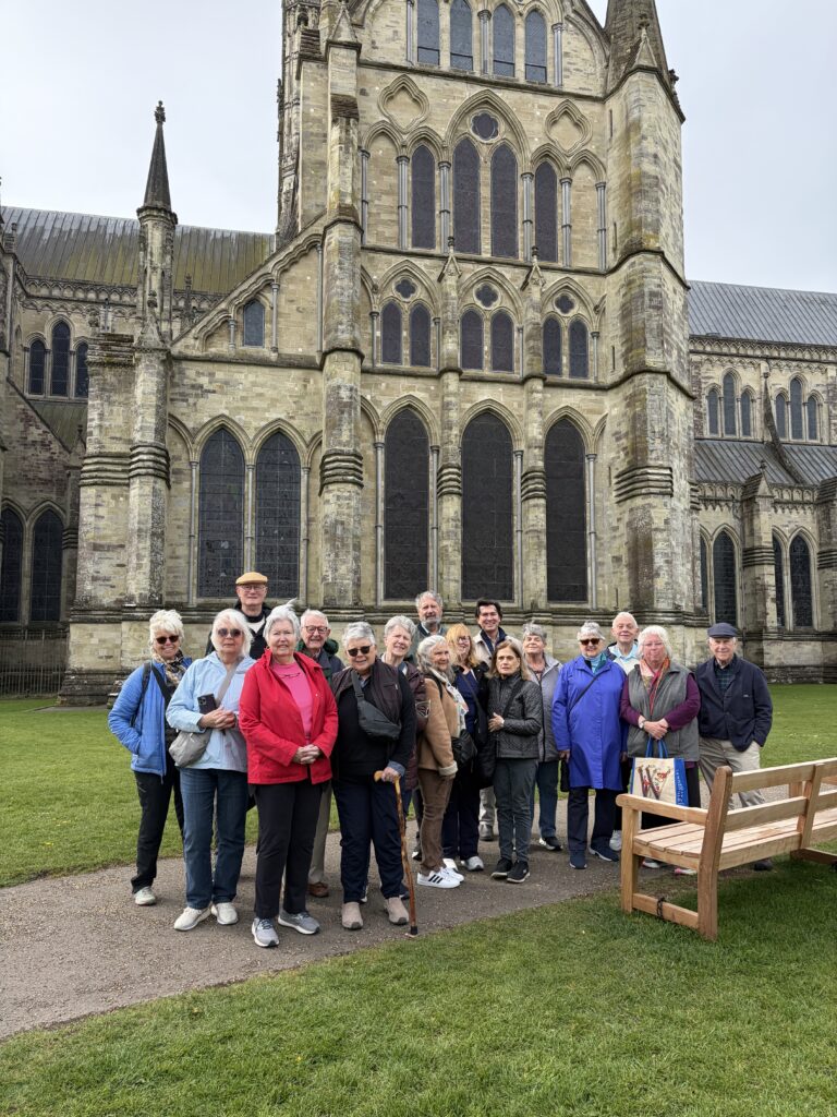 Group of parishioners from St. Mary's in front of a cathedral in England during a cathedrals pilgrimage trour
